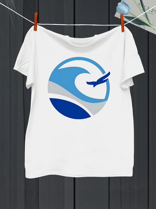 Men's Graphic T-Shirt Sweeping Blue Ocean Wave With Flying Jetliner In Circular Emblem
