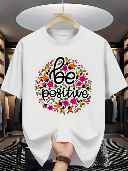 Men's Graphic T-Shirt Be Positive Surrounded By Vibrant Colorful Flowers Under Lively Petal Garland