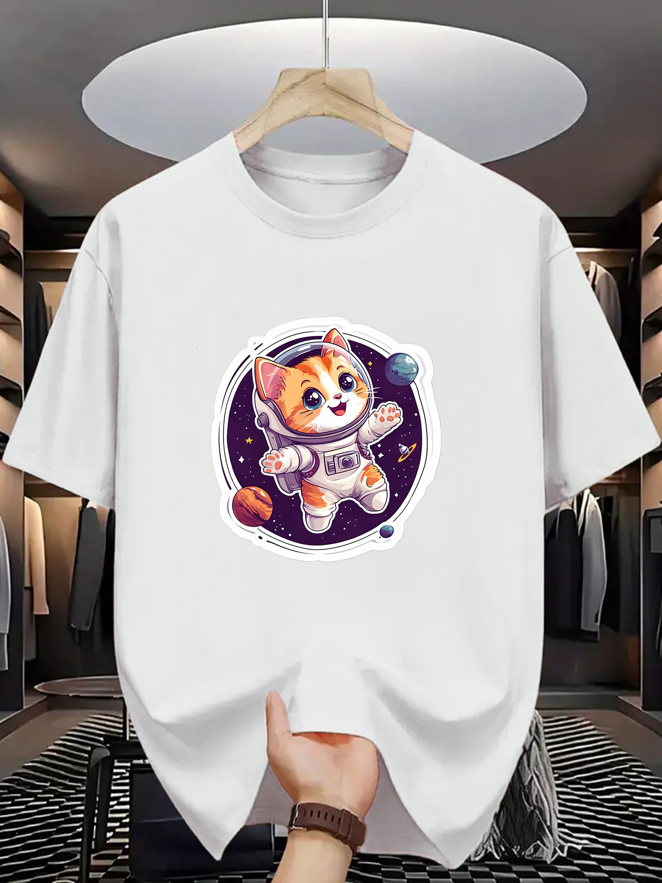 Men's Graphic T-Shirt Playful Orange Cat Floating Among Colorful Planets In Outer Space Kitten