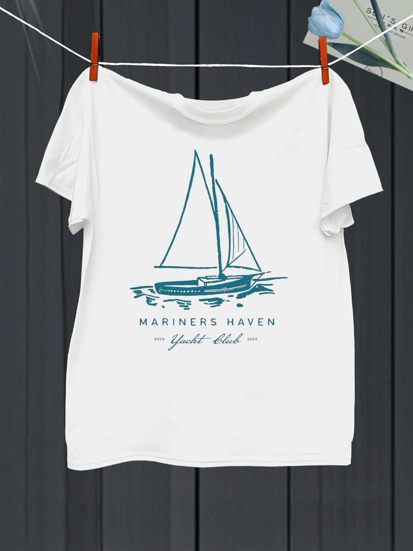 Men's Graphic T-Shirt Mariners Haven Calm Waters With Elegant Blue Sailboat Docked