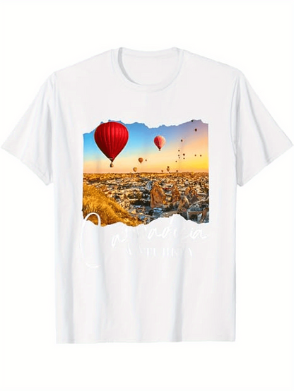 Men's Graphic T-Shirt Glowing Sunrise Sky With Colorful Balloons Floating Over Rolling Landscape Hot Air Balloon