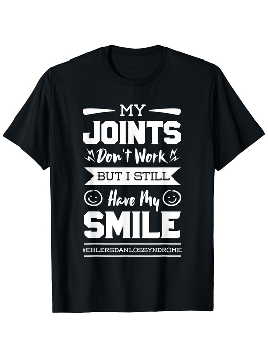 Men's Graphic T-Shirt My Joints Dont Work But I Still Have My Smile Bold White Lettering On Minimalist Black Fabric Shirt