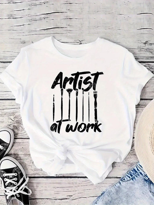 Women's Graphic T-Shirt Artist At Work With Paintbrushes Arranged Below Bold Typography