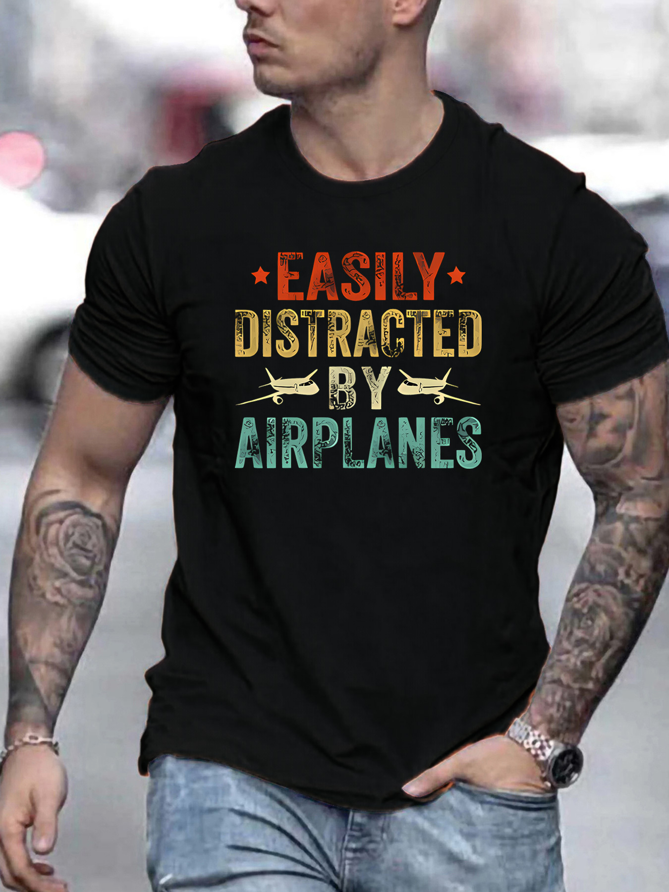 Men's Graphic T-Shirt Easily Distracted By Airplanes Bold Colored Letters With Airplane Icons Black Shirt