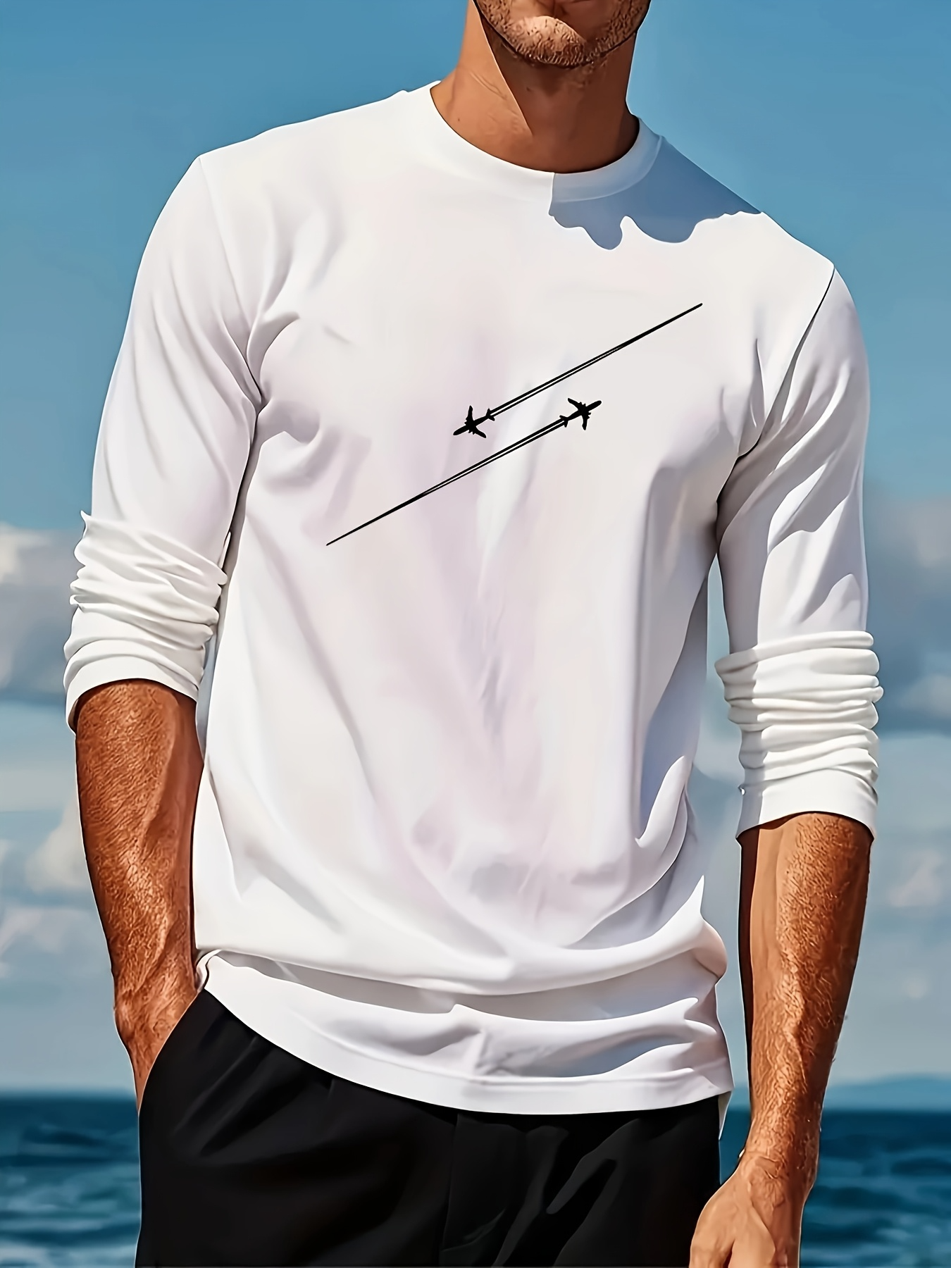 Men's Graphic T-Shirt Minimalist Jetliner Contrails Crossing Skies Under Soft White Cloud Airplane