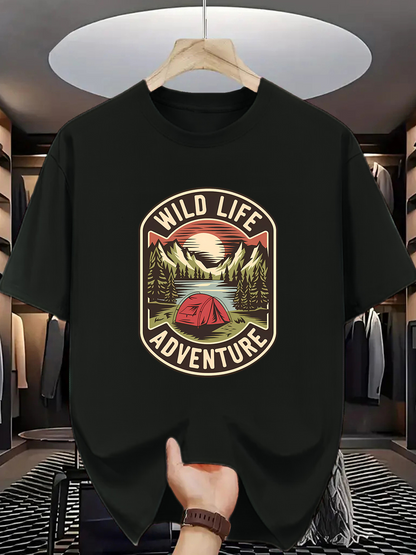 Men's Graphic T-Shirt Wild Life Adventure With Red Tent Surrounded By Majestic Mountains And Pine Trees Under Sunset Sky
