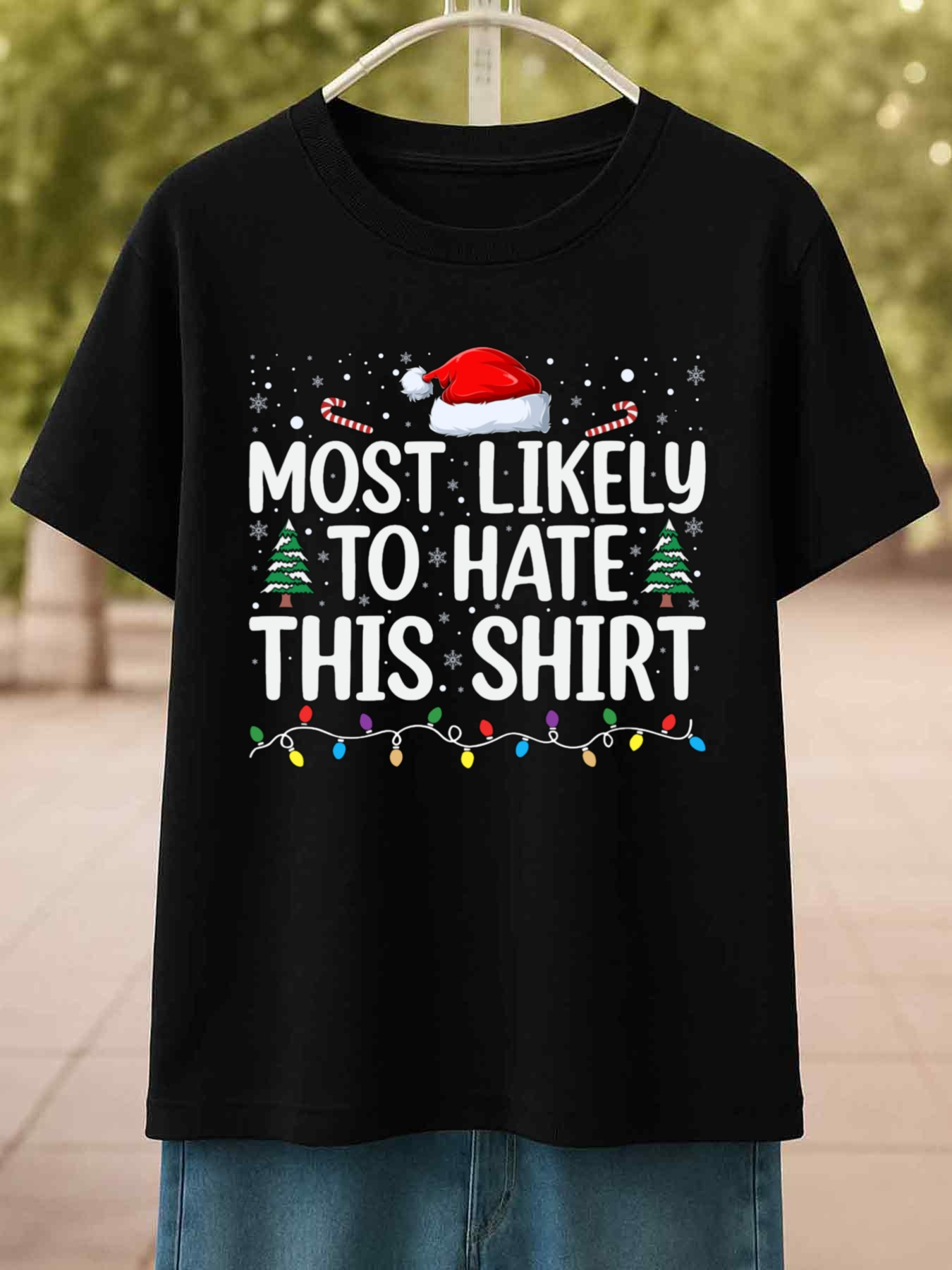 Men's Graphic T-Shirt Most Likely To Hate This Shirt With Santa Hat And Festive String Lights Christmas Trees