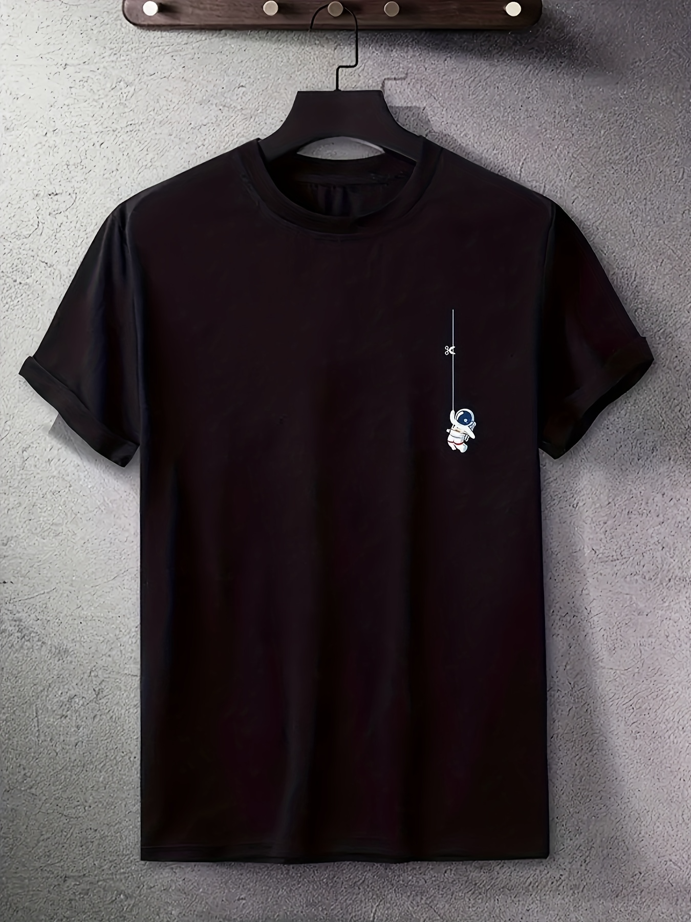 Men's Graphic T-Shirt Mini Astronaut Dangling From A Crescent Moon Over Black Sky T Shirt