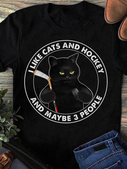Men's Graphic T-Shirt I Like Cats And Hockey With A Grumpy Black Cat Holding A Hockey Stick