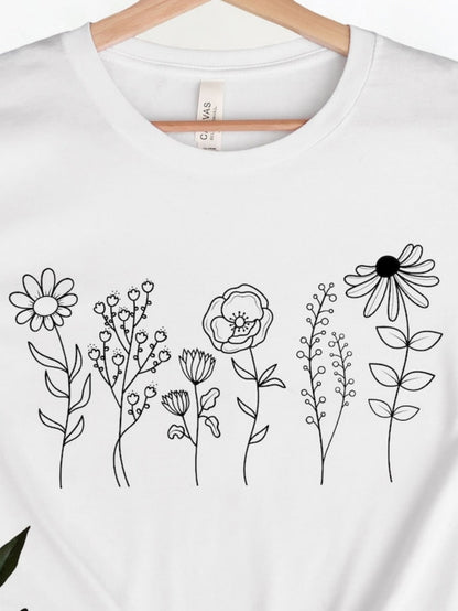 Men's Graphic T-Shirt Whimsical Delicate Linework Flowers Blooming Across The White Cotton Tee
