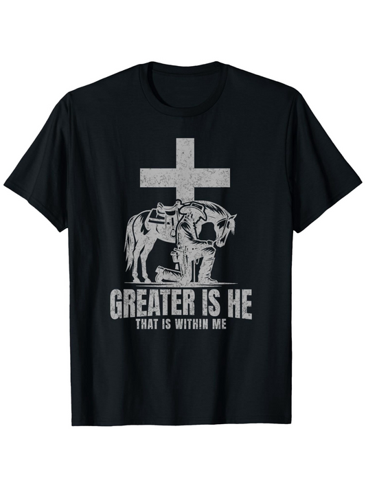 Men's Graphic T-Shirt Greater Is He With Bold Cross And Roaring Lion Under Inspirational Sunlight