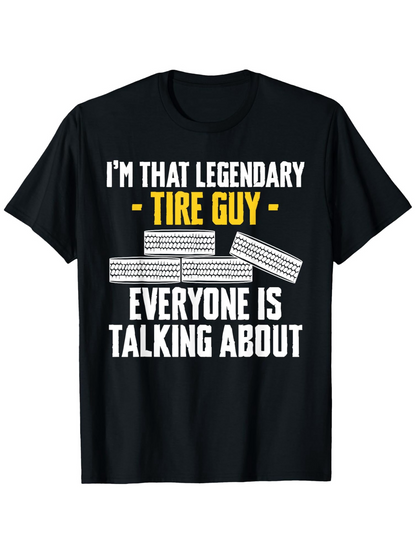 Men's Graphic T-Shirt Legendary Tire Guy Among Stacked Tires Bold Statement Black Shirt