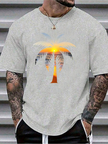 Men's Graphic T-Shirt Sunset Glow Shining Through Palm Leaves Over Tranquil Silhouette Palm Tree
