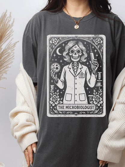 Men's Graphic T-Shirt The Microbiologist Skeleton Holding Petri Dish Under Night Sky
