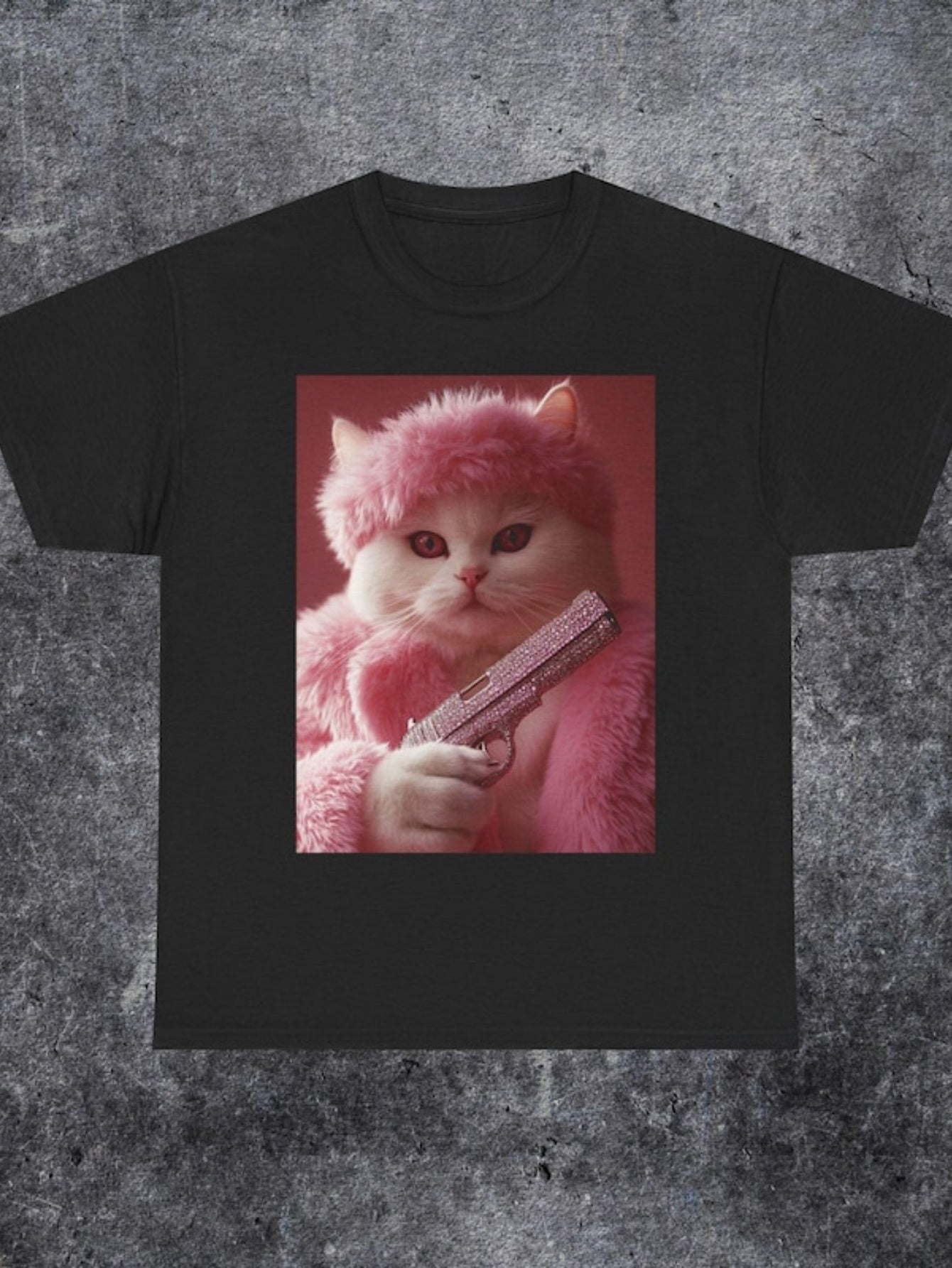 Men's Graphic T-Shirt Fluffy Pink Cat Holding A Shiny Toy Pistol In Studio