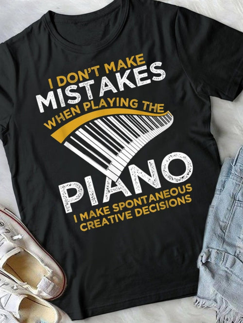 Men's Graphic T-Shirt Creative Decisions Gold White Piano Keys On Black Shirt
