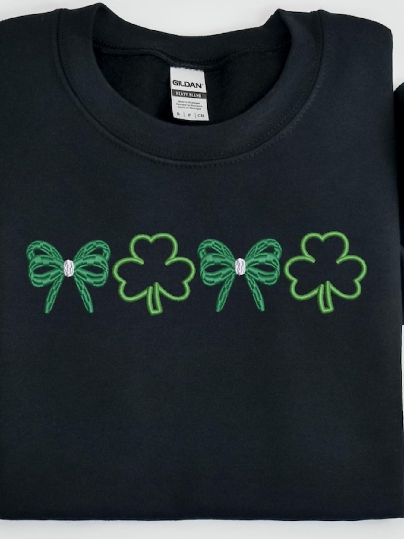 Men's Graphic T-Shirt Green Shamrock Clovers With Festive Ribbon Bows Under Springtime Light