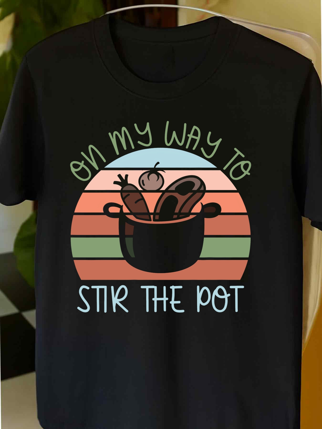 Men's Graphic T-Shirt On My Way To Stir The Pot Colorful Striped Background With Vegetables Inside Cooking Pot