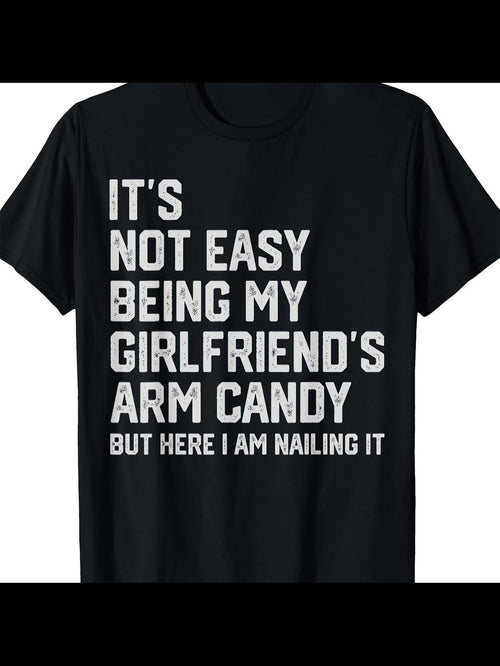 Men's Graphic T-Shirt Its Not Easy Being My Girlfriends Arm Candy Nailing It Bold Slogan Statement White Letters Black Shirt