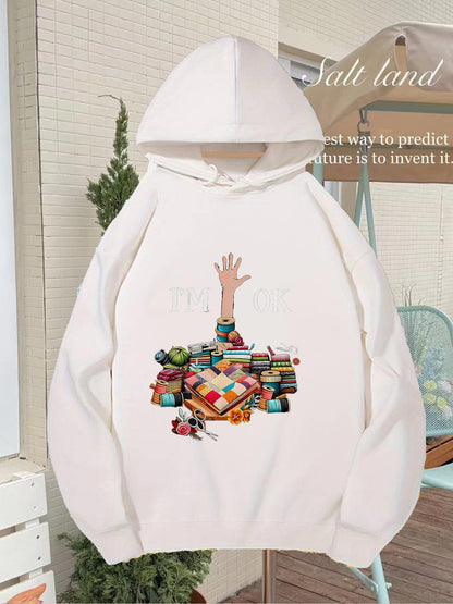 Women's Graphic Hoodie Reaching Hand With Colorful Books Stacked On Wooden Table