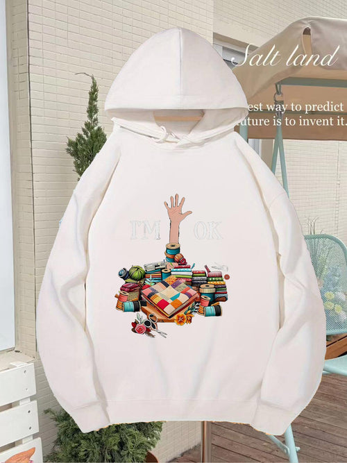 Women's Graphic Hoodie Reaching Hand With Colorful Books Stacked On Wooden Table