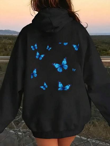Women's Graphic Hoodie Neon Blue Butterflies Floating Gently Across Midnight Black Hoodie