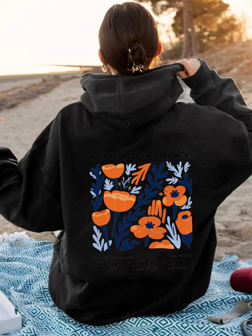 Women's Graphic Hoodie Vibrant Blossoms Among Blue Leaves Under Sunset Flowers