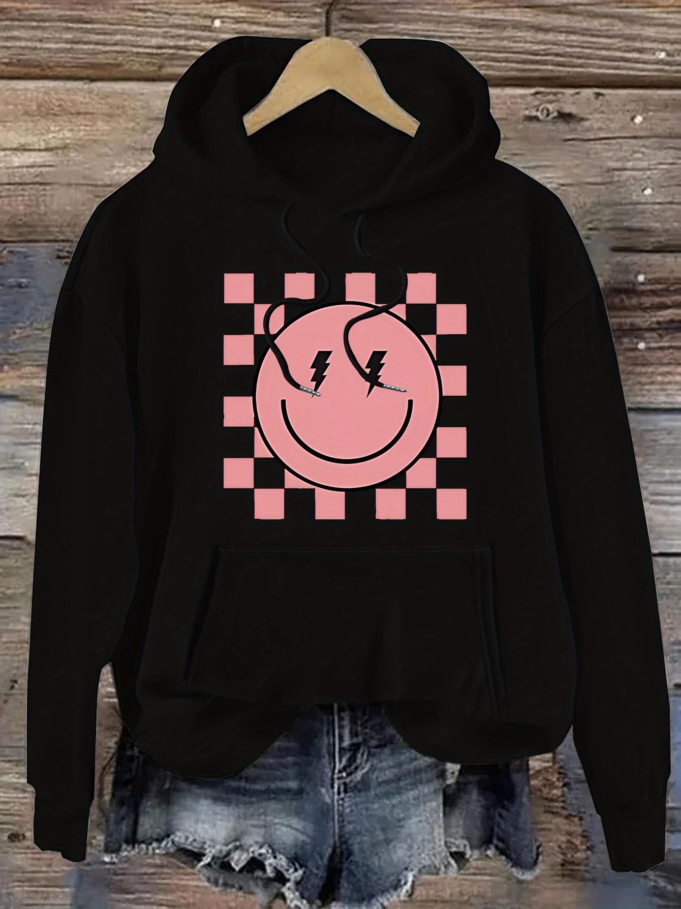 Women's Graphic Hoodie Playful Checkerboard Background With Electric Pink Smiling Face