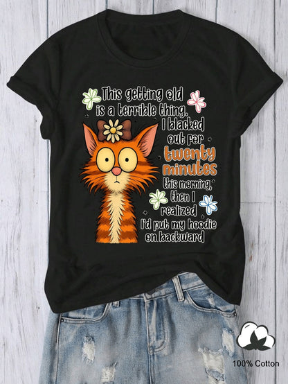 Women's Graphic T-Shirt This Getting Old Is A Terrible Thing I Blacked Out For Twenty Minutes This Morning Then I Realized Id Put My Hoodie On Backward Wide Eyed Orange Striped Feline With Small Daisy Flower Adorned Cat